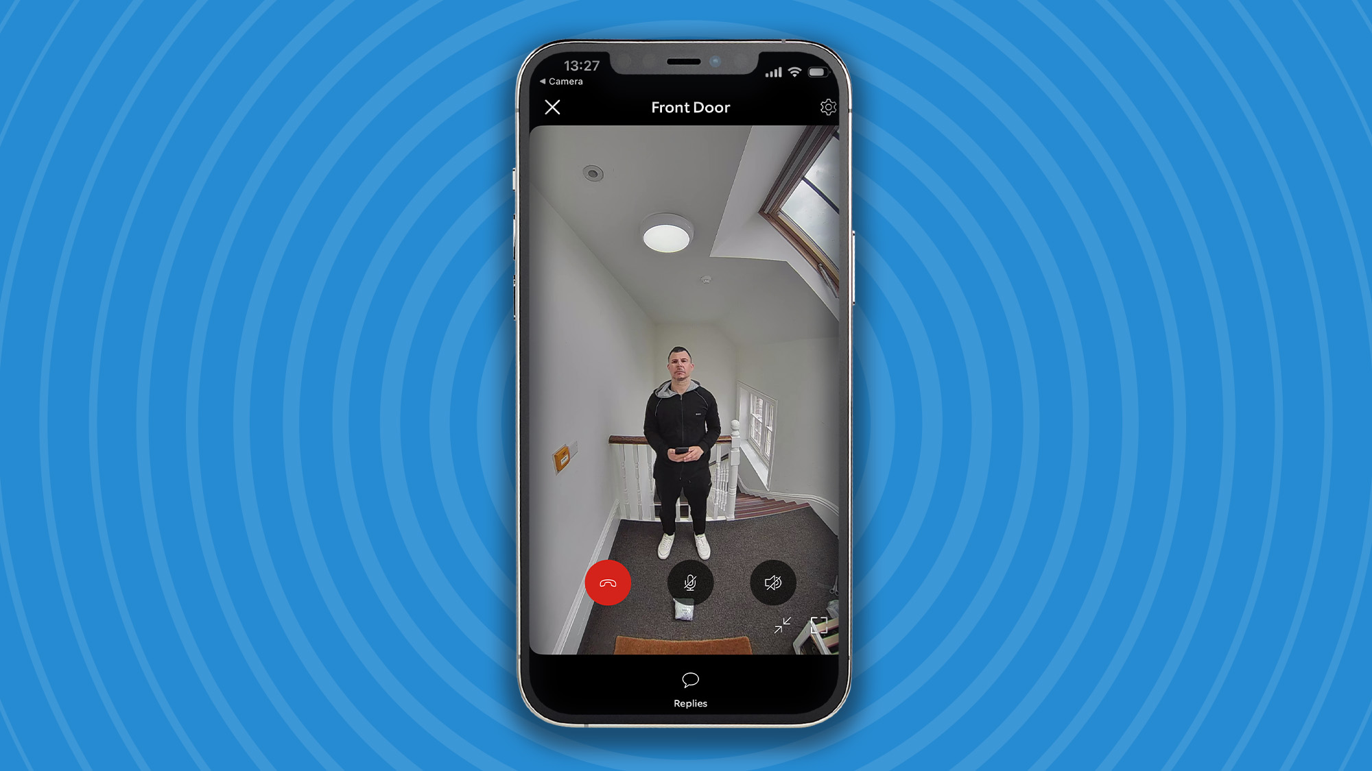 iPhone with still showing man at front door, captured by Ring Battery Video Doorbell Plus (2nd Gen)
