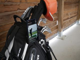 The phone stand used with the Garmin Approach R10 launch monitor