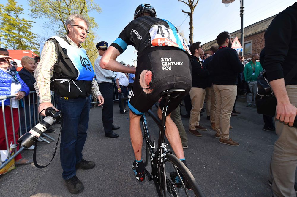 Chris Froome (Team Sky) finsihes with torn shorts after a crash.