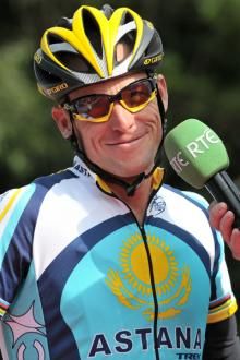 Lance Armstrong (Astana) in conversation with the announcer at the start of stage one.