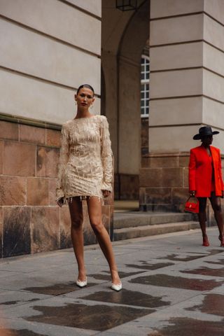 woman wearing sequin dress and heels