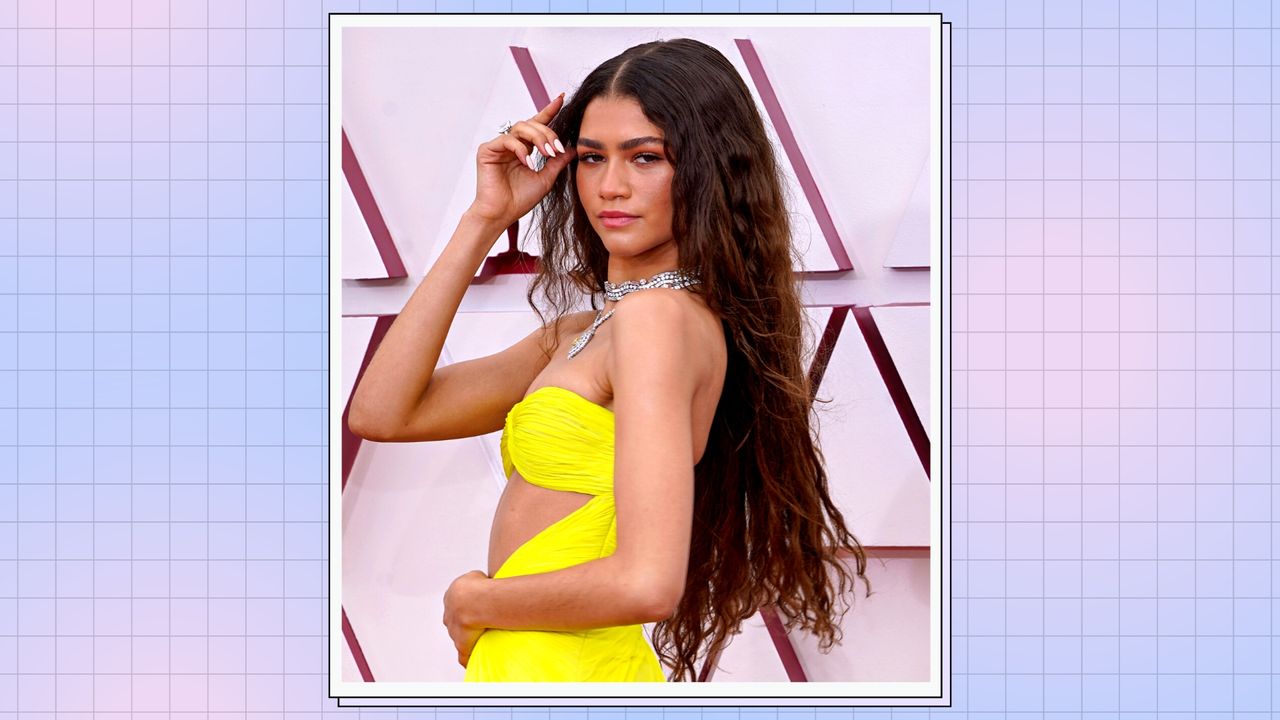 Zendaya pictured wearing a yellow dress with &#039;mermaid hair&#039; waves as she attends the 93rd Annual Academy Awards at Union Station on April 25, 2021 in Los Angeles, California. / in a blue and purple template