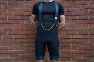 Male cyclist wearing the MAAP Alt_Road Cargo Bib Shorts which are among the best cargo bib shorts