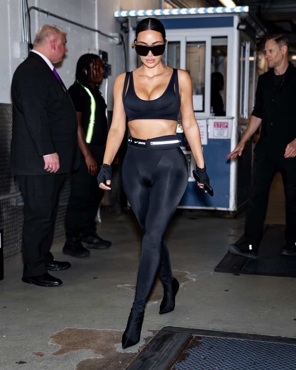 Kim Kardashian wore all-black pantaboots to celebrate the launch of NikeSKIMS
