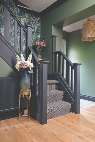 hallway and staircase design with wallpaper and paint