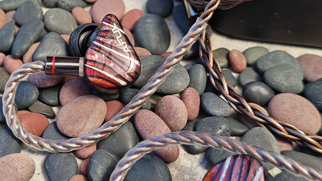 Various photos of the Aful Performer 8s IEM.
