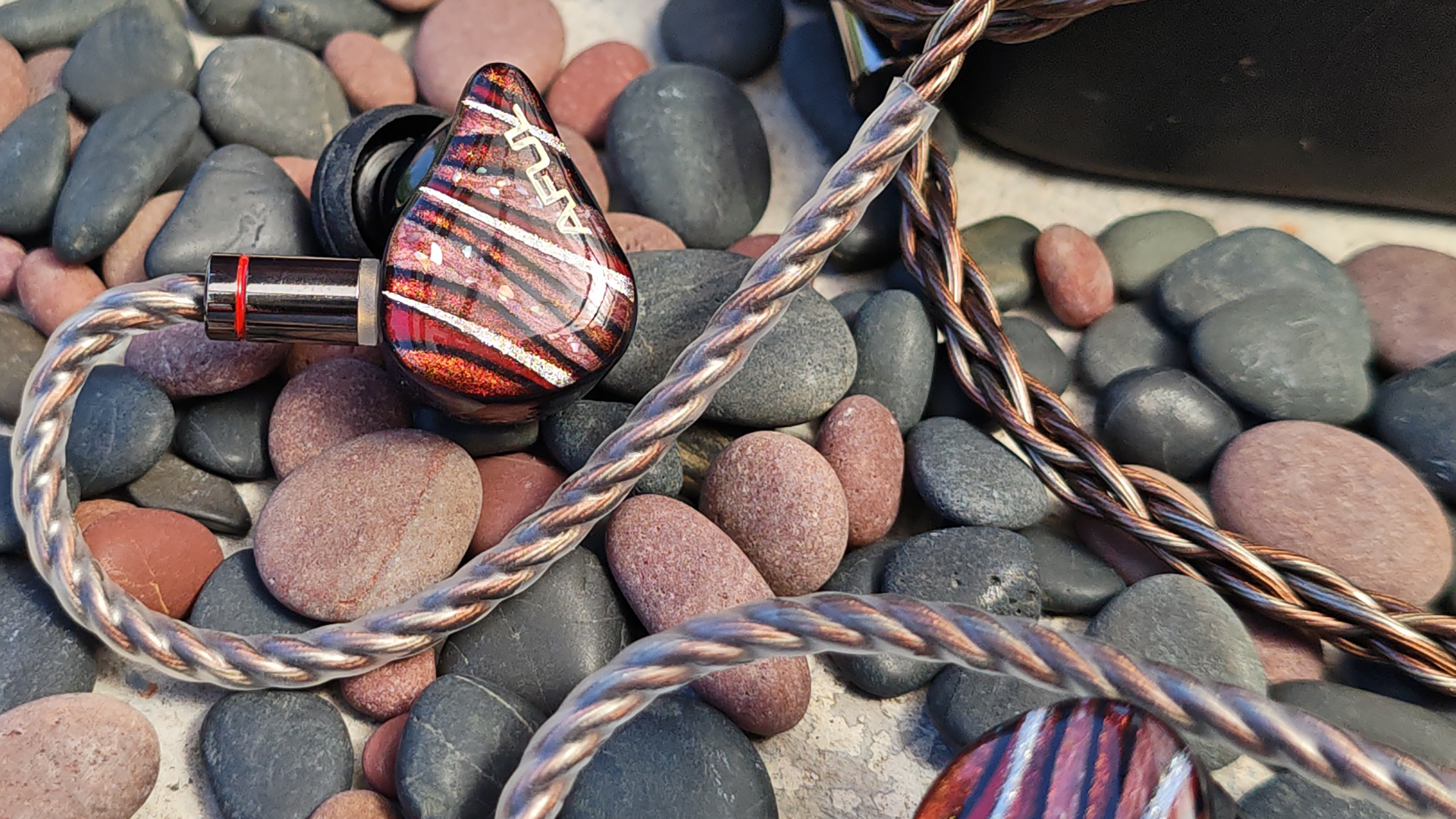 Various photos of the Aful Performer 8s IEM. 