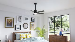 Hunter Stylus Ceiling Fan installed in a bedroom setting