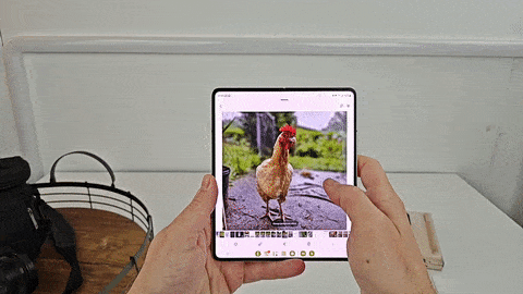 Demonstrating the new two-handed drag-and-drop feature on the Samsung Galaxy Z Fold 5