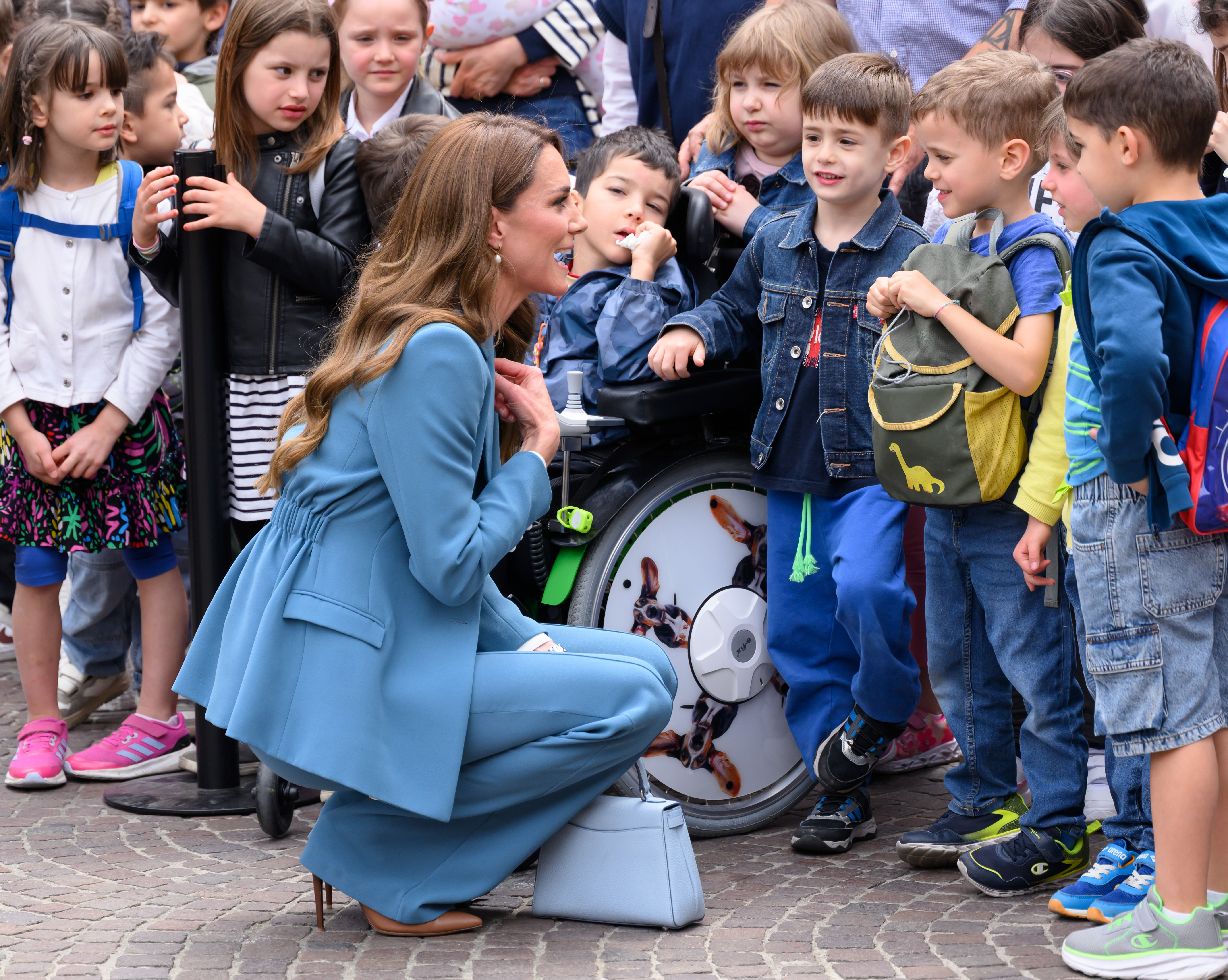 Kate Middleton carries a new powder blue Asprey bag during her visit to Italy