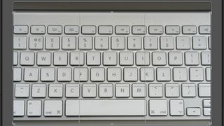 Gridlines over a computer keyboard to show any barreling
