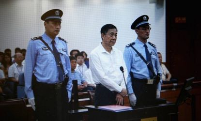 Disgraced Chinese politician Bo Xilai (center) at his trial on charges of bribery, corruption, and abuse of power.