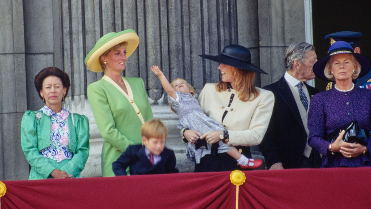 A young Princess Beatrice gets a bit bored on the balcony of the palace in 1990