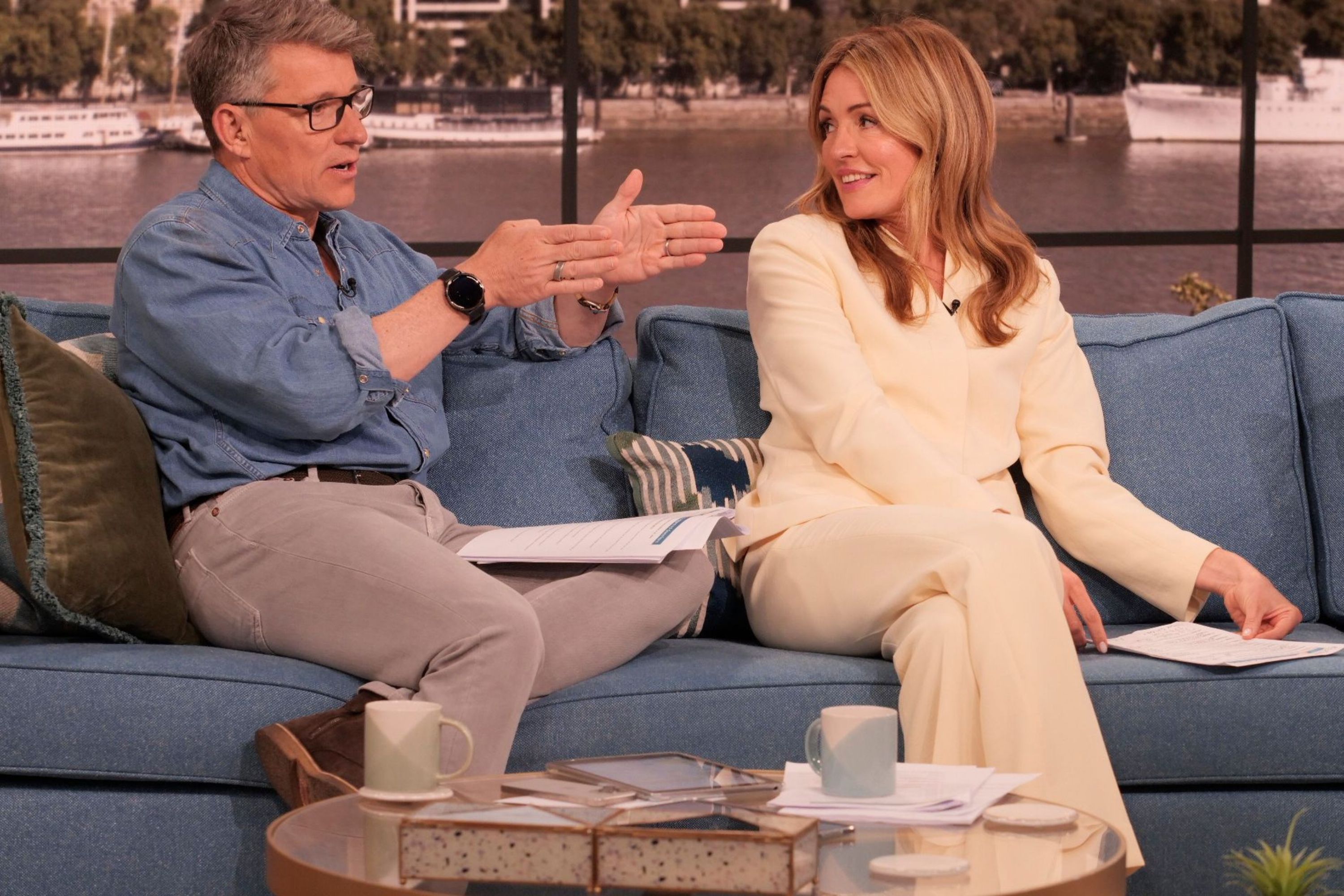 Cat Deeley on the sofa in butter yellow suit next to Ben Shephard on This Morning