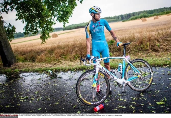 Jacopo Guarnieri waits for the Astana team car