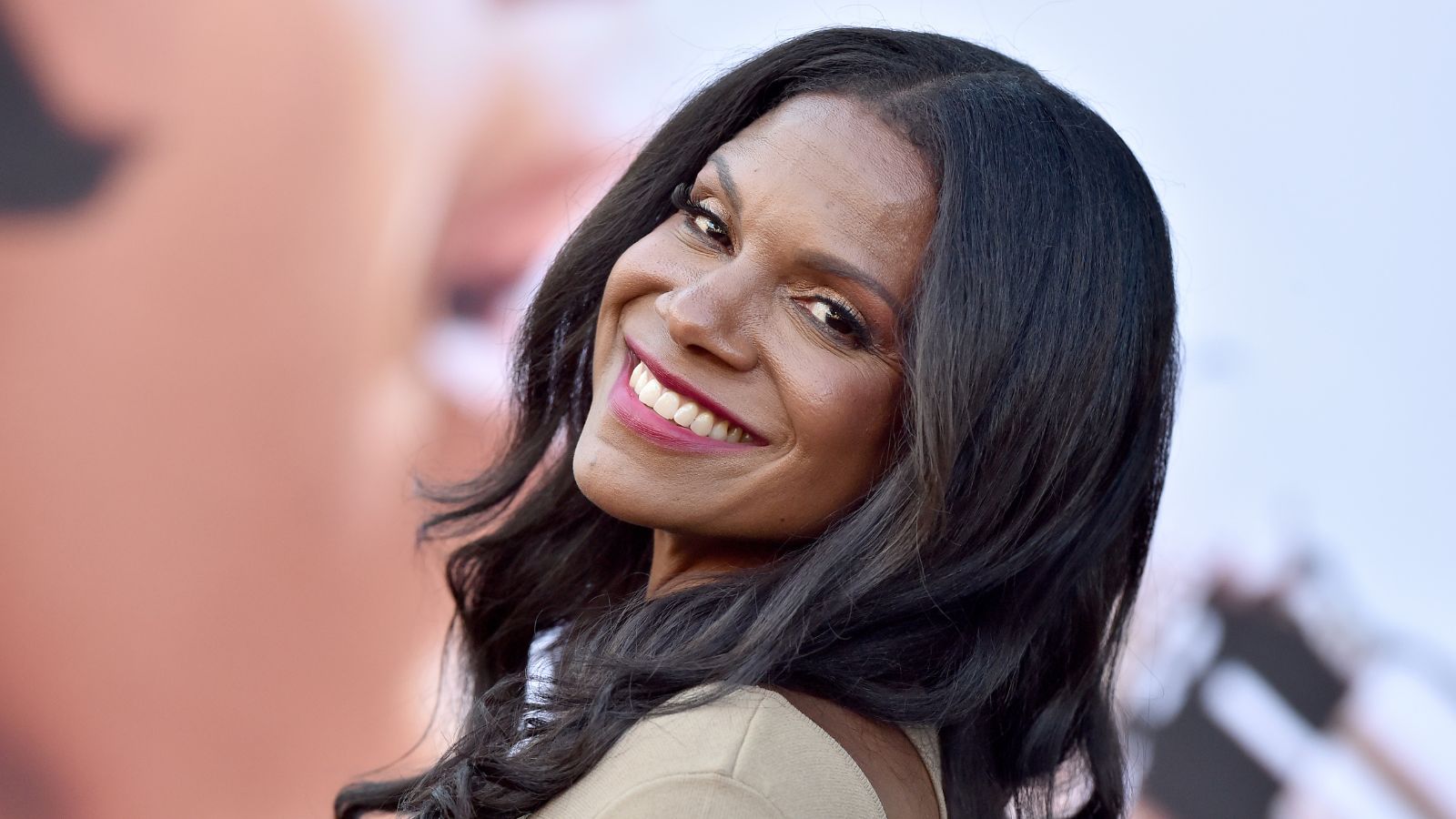 audra mcdonald on a plain background