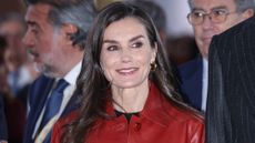 Queen Letizia of Spain attends the opening of ARCO wearing a red leather jacket