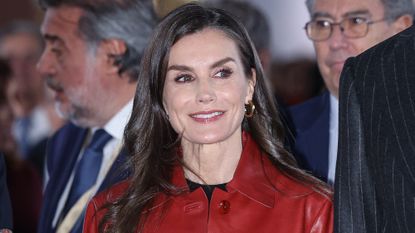 Queen Letizia of Spain attends the opening of ARCO wearing a red leather jacket