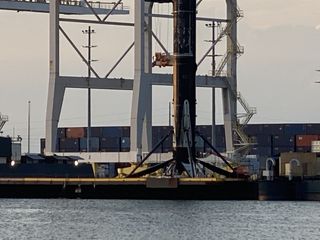 SpaceX's most flown Falcon 9 rocket, the 10-time flier B1051, arrives in Port Canaveral, Florida on May 12, 2021 after launching 60 Starlink satellites into orbit from Cape Canaveral Space Force Station on May 9.