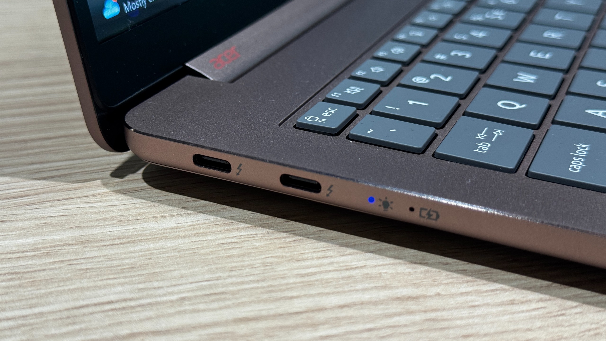 Acer Swift Air 16 laptop, focusing on the screen, ports, and keyboard