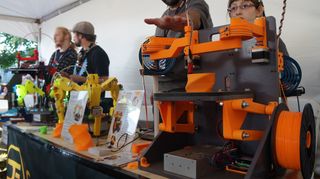 A RepRap 3D printer made of mostly 3D printer parts, shown here at World Maker Faire on Sept. 22, 2013.