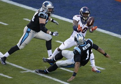 Denver Broncos’ Von Miller (58) strips the ball from Carolina Panthers’ Cam Newton (1) during the first half of the NFL Super Bowl 50