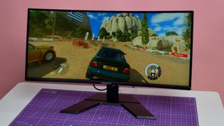 A Gigabyte GS34WQC gaming monitor on a desk