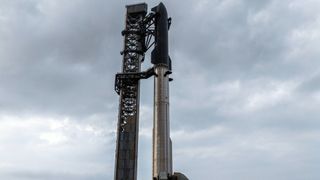 SpaceX Starship Flight 12 stands atop launch pad before May 2026 test flight under cloudy skies