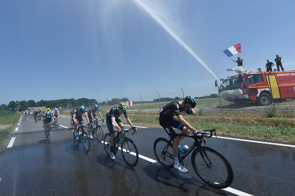 Riders get some relief from the heat.