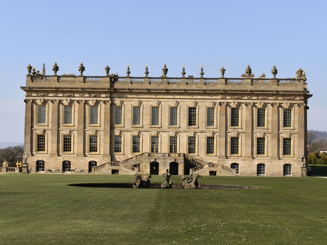 Large manor building in a green park