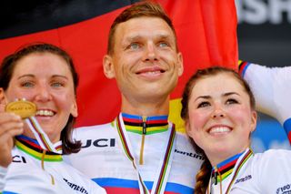 BRUGES BELGIUM SEPTEMBER 22 Tony Martin of Germany celebrates winning the gold medal on the podium ceremony the day withdraws from professional cycling after the 94th UCI Road World Championships 2021 Team Time Trial Mixed Relay a 445km race from KnokkeHeist to Bruges flanders2021 TT on September 22 2021 in Bruges Belgium Photo by Luc ClaessenGetty Images