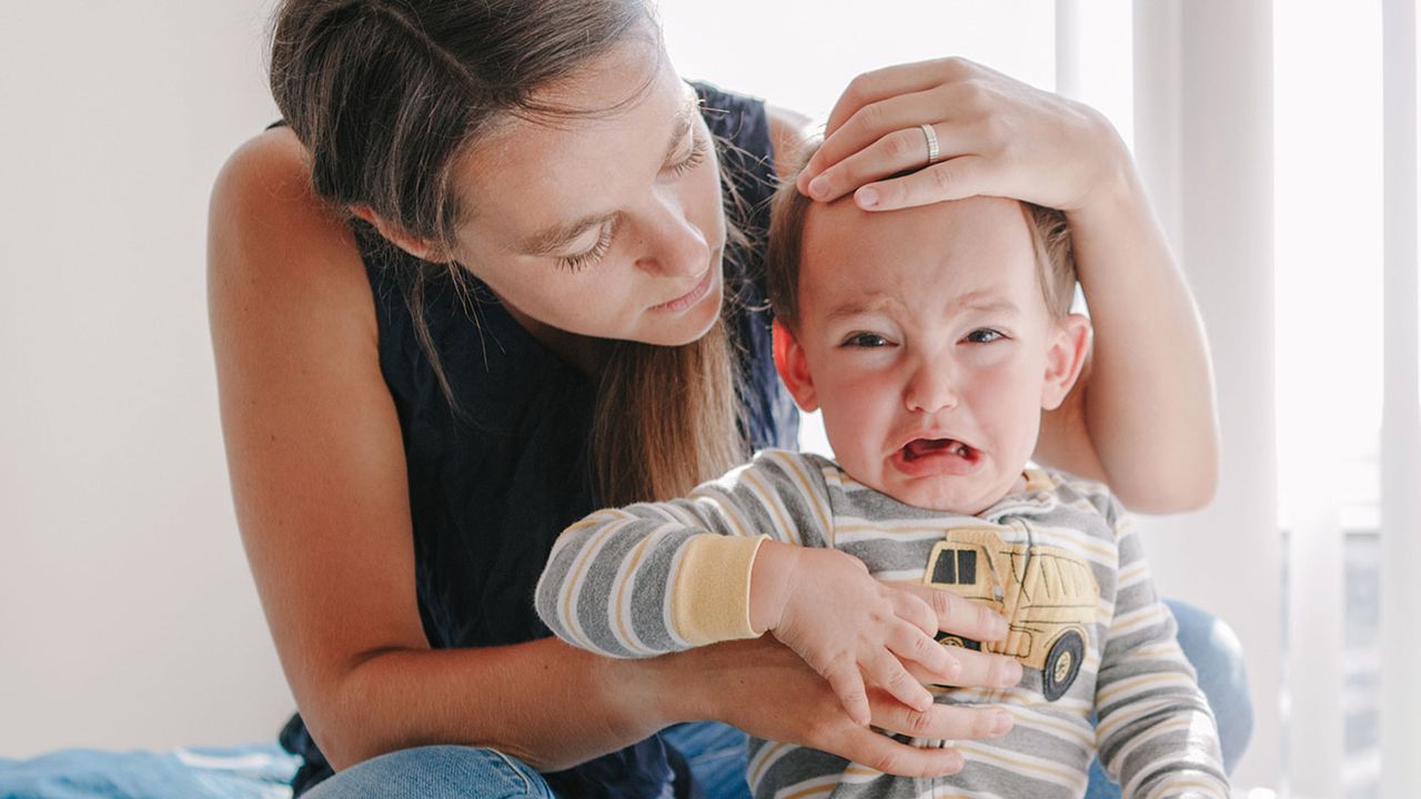 Woman with a crying baby