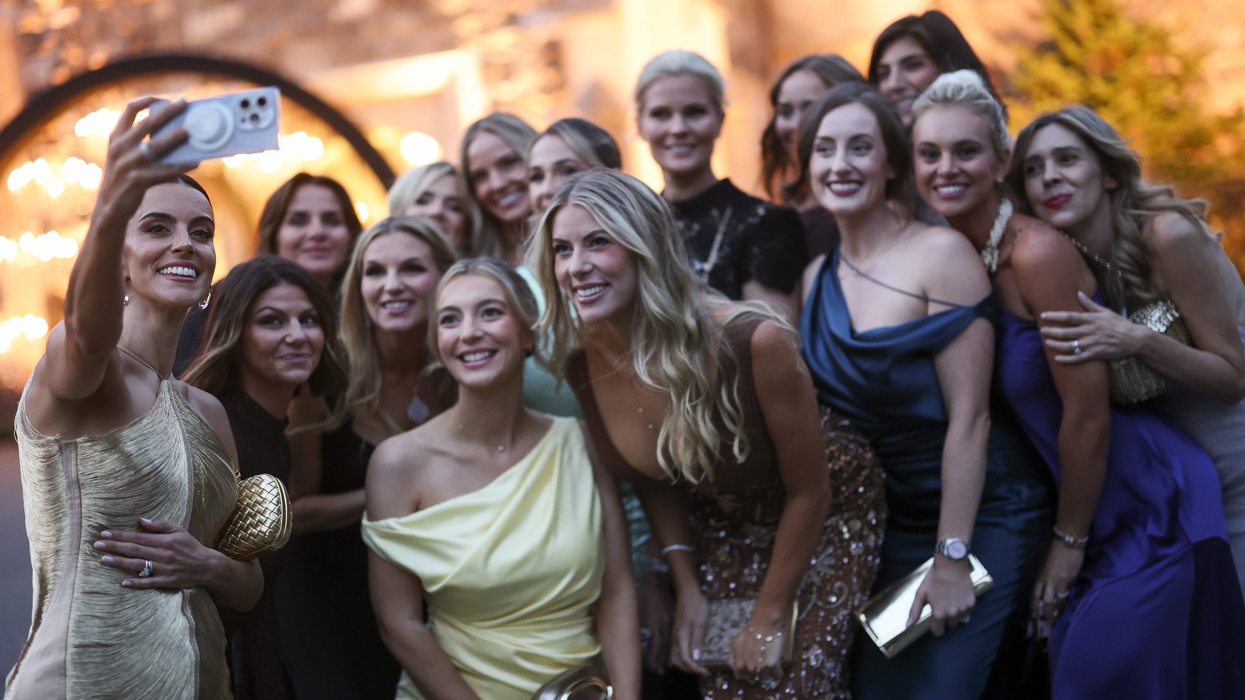 The European players' wives and girlfriends pose for a seflie at the Ryder Cup gala dinner