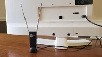 Clear TV HDTV Antenna placed on a wooden table