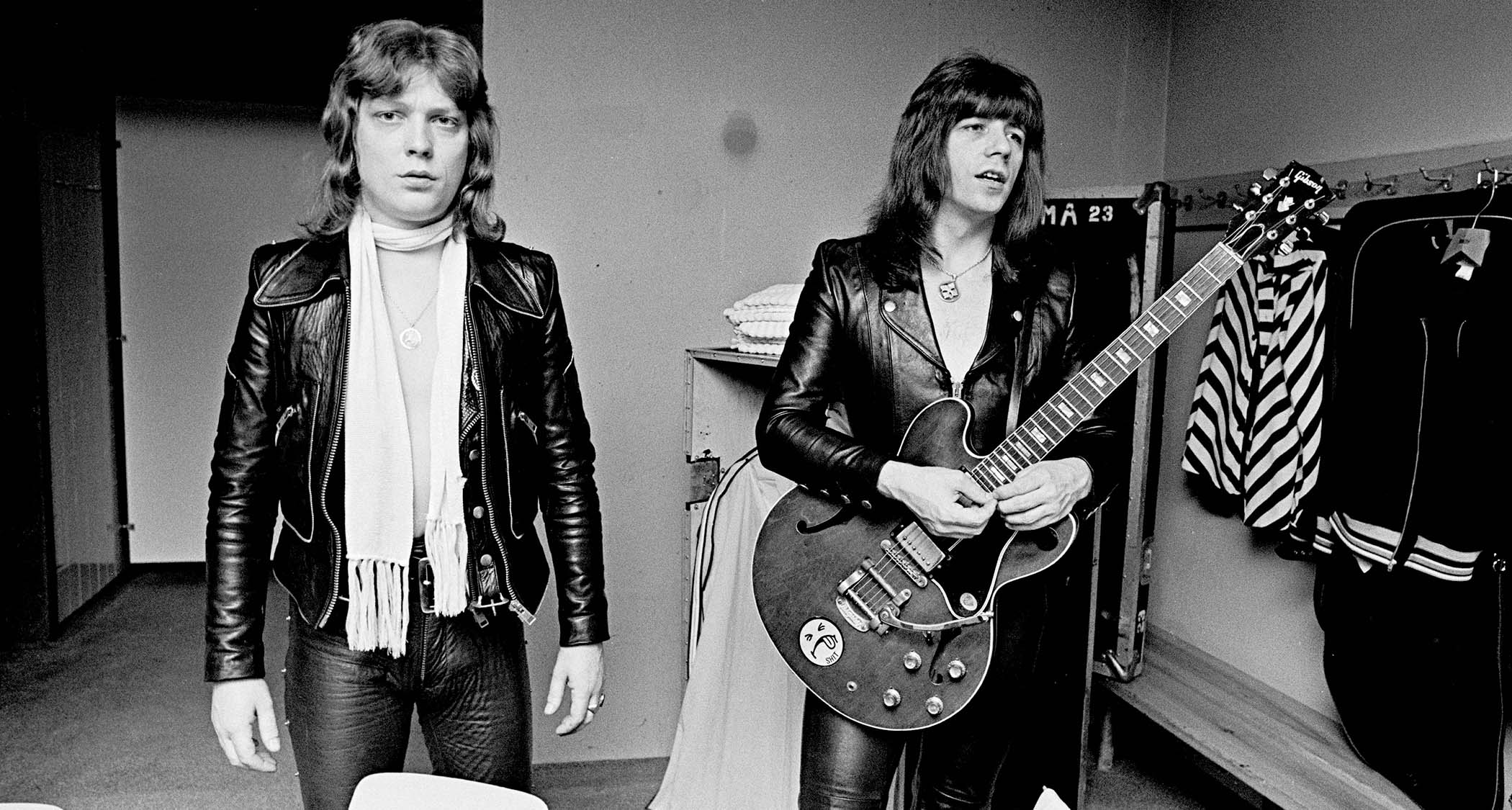 The Sweet's Andy Scott and Steve Priest backstage in Denmark, 1975