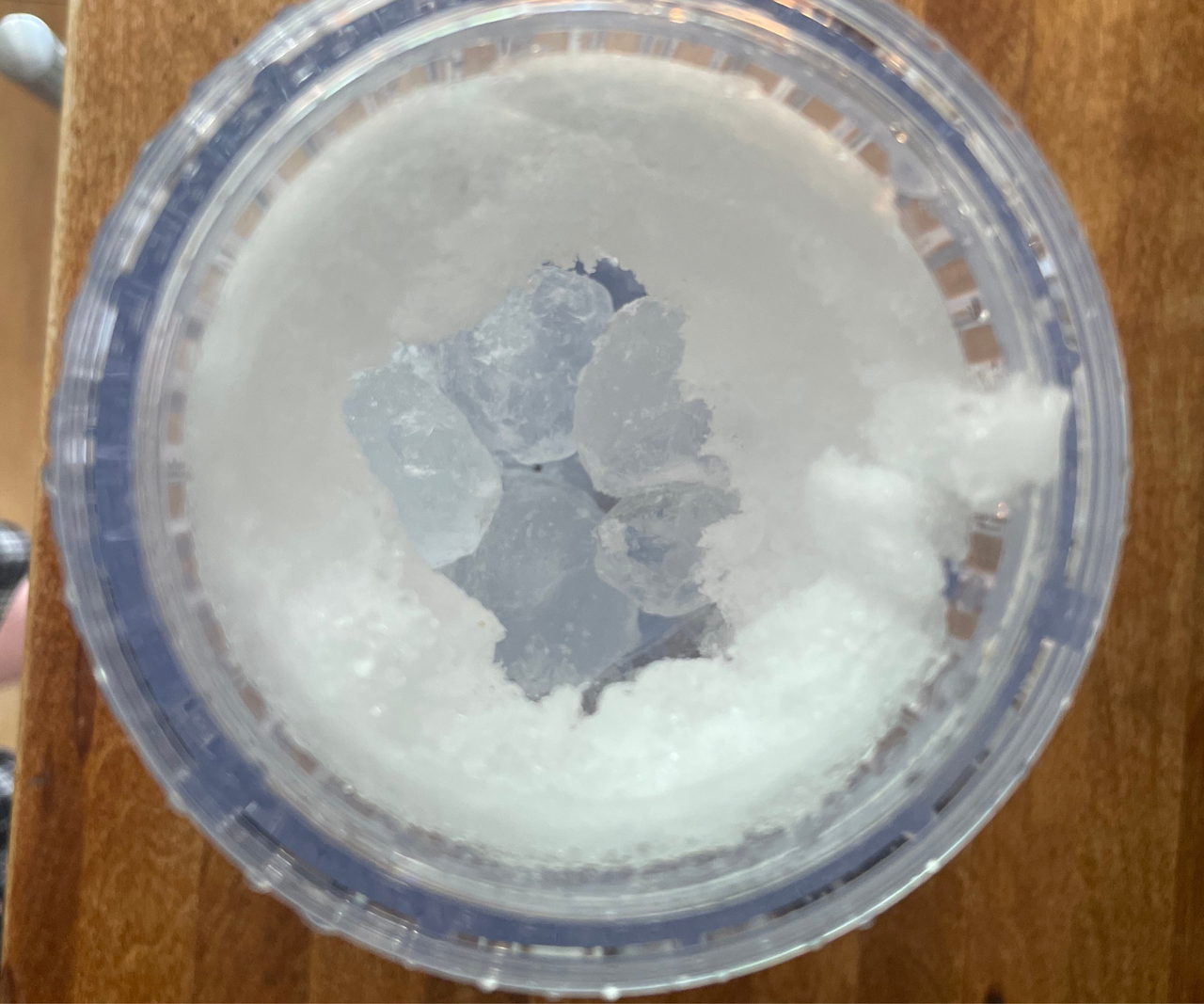 Beast Mighty 850 blender viewed from above with ice cubes inside.