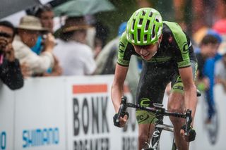 Joe Dombrowski (Cannondale-Garmin) fights his way to the front through the heavy rain.