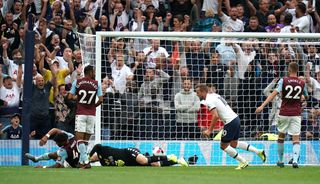 Harry Kane scored his first goal at Tottenham's new stadium in a 3-1 win over Aston Villa on the opening day of the 2019-20 campaign, holding off a defender before firing home