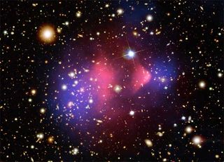 A composite image of the Bullet Cluster, a much-studied pair of galaxy clusters that have collided head on. One has passed through the other, like a bullet traveling through an apple, and is thought to show clear signs of dark matter (blue) separated from hot gases (pink).