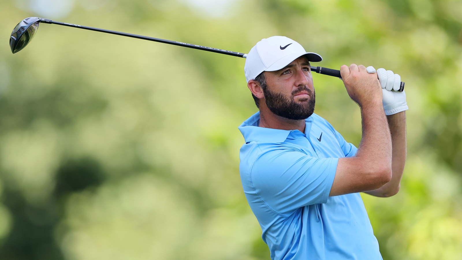 Scottie Scheffler hits a driver