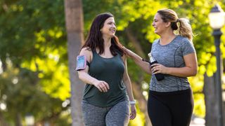Two women walking to lose weight
