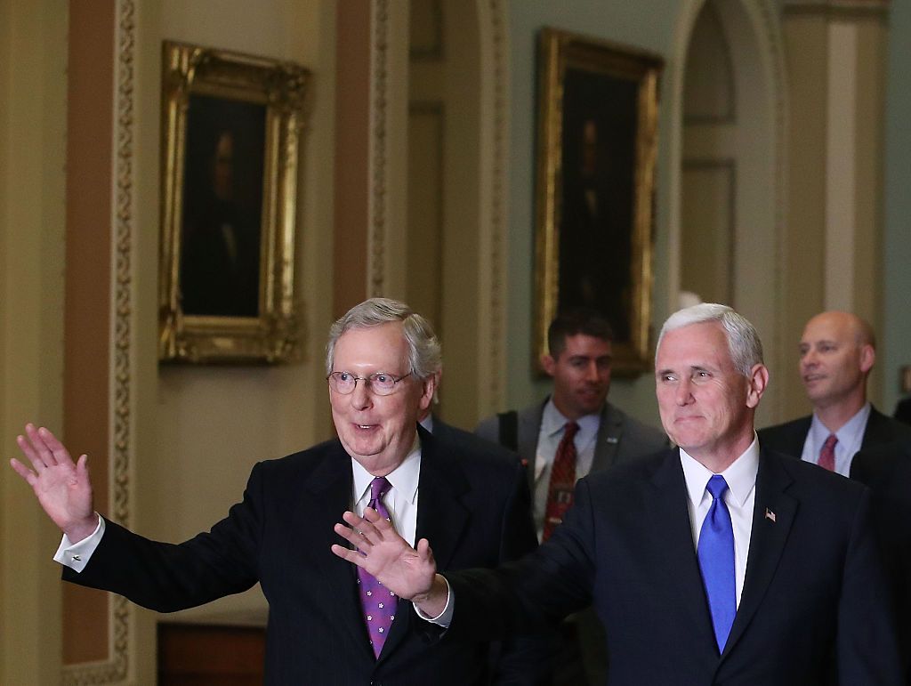 Mitch McConnell and Mike Pence, plotting to repeal ObamaCare