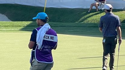 Why A PGA Tour Caddie Has 'Kick Me' On His BibWhy A PGA Tour Caddie Has 'Kick Me' On His Bib