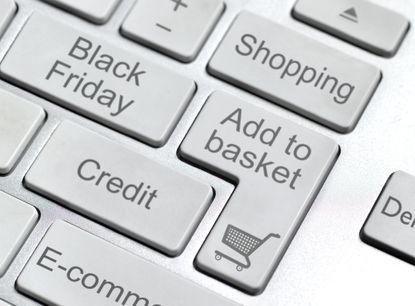 Computer keys relabeled that say: Black Friday, Add to Basket, Ecommerce and Shopping.