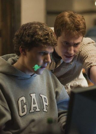 Jesse Eisenberg and Joseph Mazello in The Social Network.