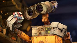Wall-E inspects a Rubik's Cube in WALL-E