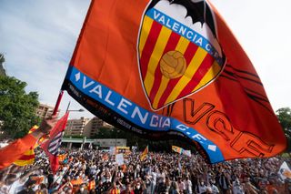 Valencia CF fans take part in a protest against the management of Singaporean Business magnate and owner of the club, Peter Lim, in Valencia on May 8, 2021.