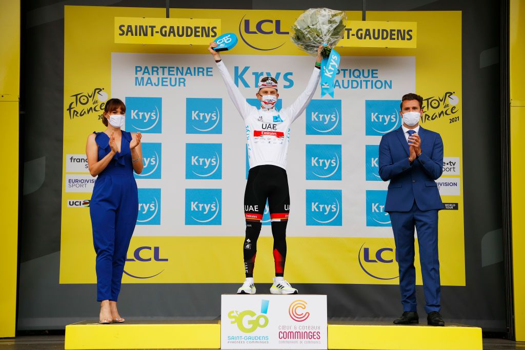 SAINTGAUDENS FRANCE JULY 13 Tadej Pogaar of Slovenia and UAETeam Emirates white best young jersey celebrates at podium during the 108th Tour de France 2021 Stage 16 a 169km stage from Pas de la Casa to SaintGaudens LeTour TDF2021 on July 13 2021 in SaintGaudens France Photo by Chris GraythenGetty Images