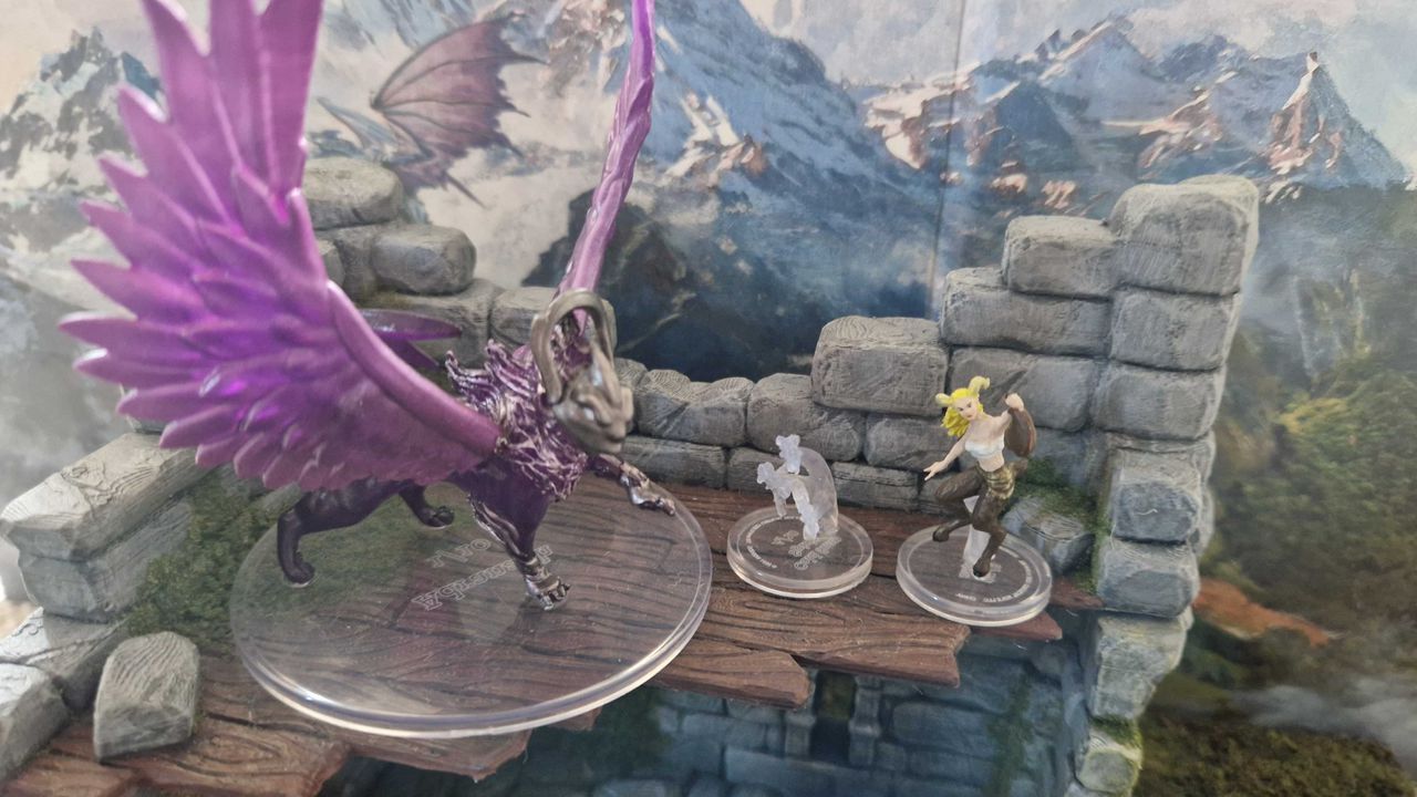 Monsters of Tal'Dorei (Set 2) Artonach and Satyr miniatures on top of a ruin