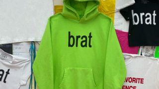 Close up on Charli XCX Brat hoodie